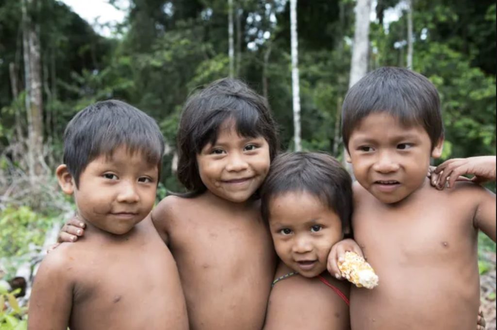 happy amazon tribes childen laughing and smiling