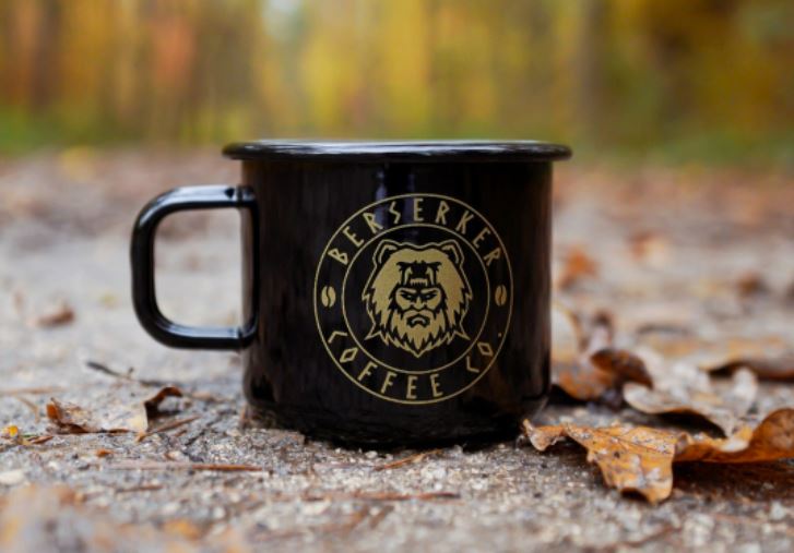 black berserker coffee mug in outdoor setting